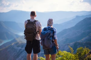 marveling-the-view-on-the-top-of-the-mountain