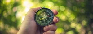 woman-holding-compass